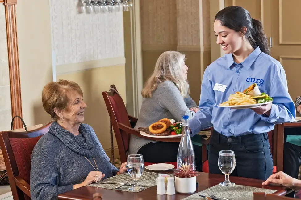 a waitress serving food