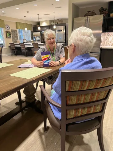 two women playing cards